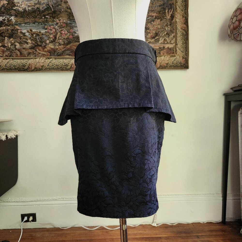 Black peplum skirt (no label)
